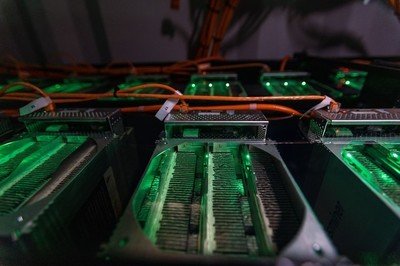 Expansive cryptocurrency mining farm illuminated at night