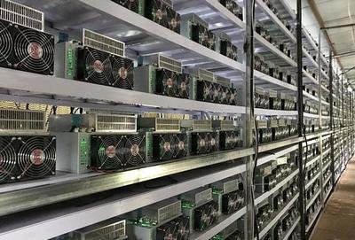 Vast Bitcoin mining farm with rows of ASIC miners