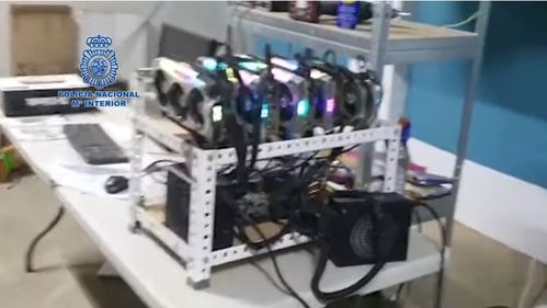 A close-up of a Bitmain Antminer, showcasing its intricate design and cooling system.